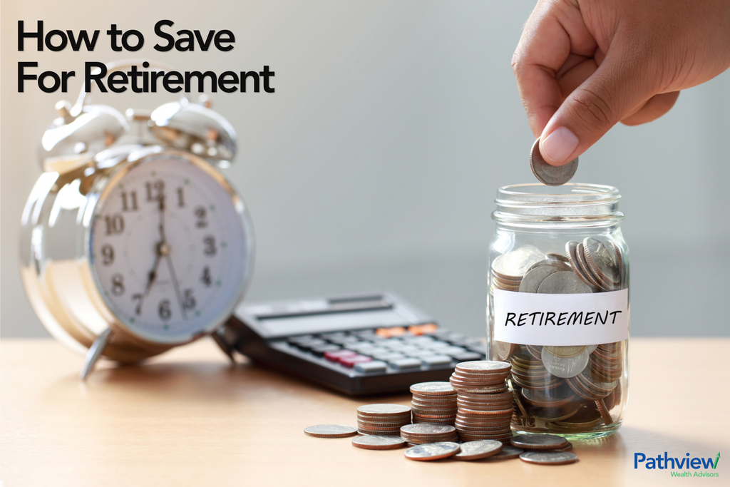 A hand drops a coin into a glass jar labeled "RETIREMENT" that is partially filled with coins. Stacks of coins sit beside the jar on a desk, with a calculator and a blurred alarm clock in the background. The image includes the headline "How To Save For Retirement" and the Pathview Wealth Advisors logo, symbolizing long-term retirement savings and financial planning.